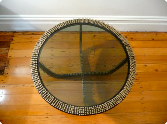 artist revamps wooden side table by using 1500 scr