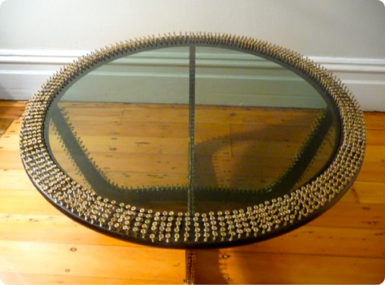 artist revamps wooden side table by using 1500 scr