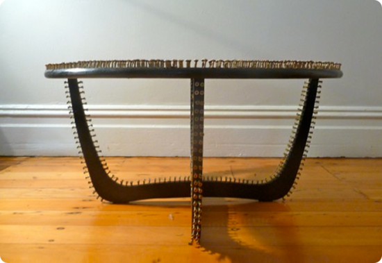 artist revamps wooden side table by using 1500 scr