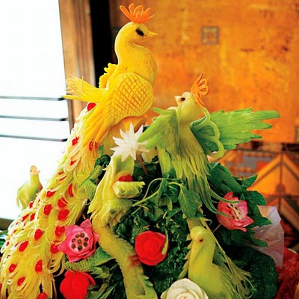 birds carved from fruits and vegetables