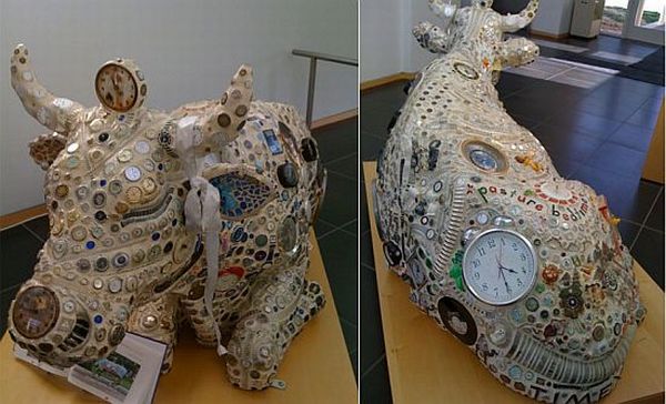 Cow sculpture from recycled watches and clocks