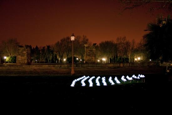 luzinterruptus aliens in picnic light art installa