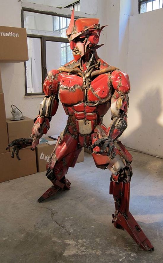 transformer sculpture made from actual auto parts 