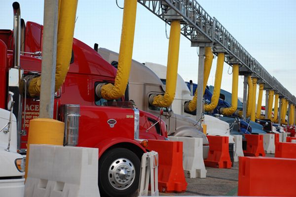 Truck stop electrification and tolling