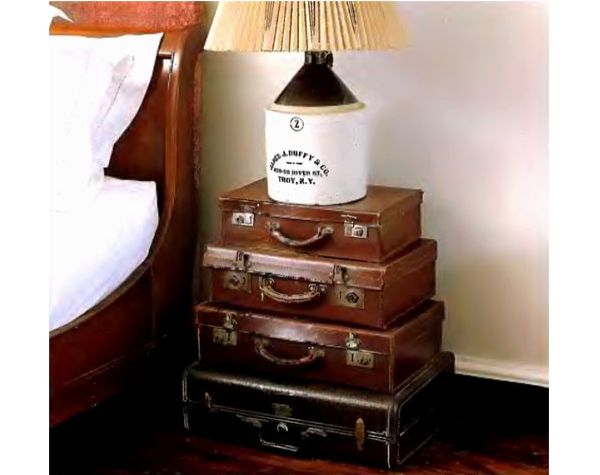Unique pile up suitcase table design