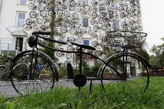 unusual bike shop features bicycle bedecked faade 