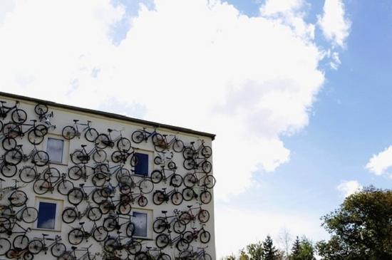 unusual bike shop features bicycle bedecked faade 
