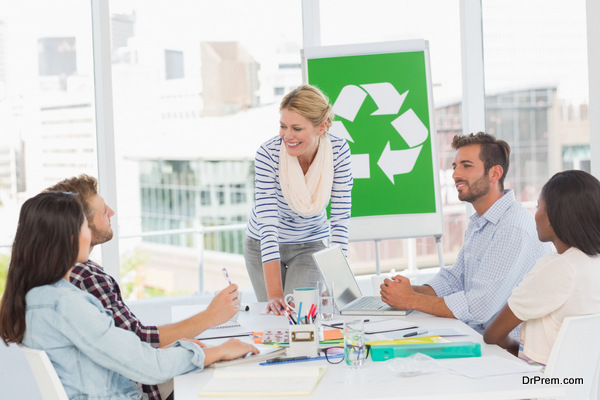 Team having a meeting about recycling policy