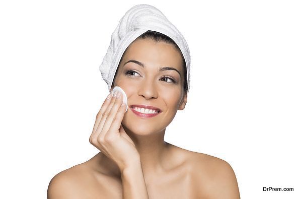 Beauty Portrait Of Beautiful Smiling Woman Washes Her Face With Towel On Head Isolated On White Background
