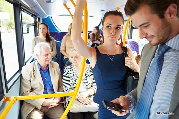 Passengers Standing On Busy Commuter Bus