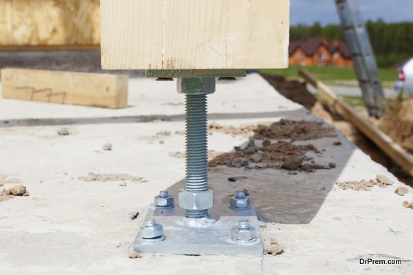 Closeup of wooden pillar on the construction site with screw. Wooden Pillars are structures that can be placed on Foundations or Platforms.