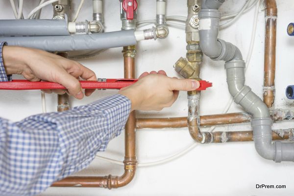 plumber fixing central heating system