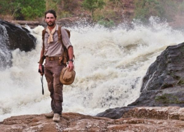 Levison Wood stands at the top of Murchsion Falls. The River Nile squeezes through a gap of six metres and drops forty metres to create one of the most epic sights on the whole course of the river and is called Murchsion Falls, named after the president of the Royal Geographical Society at the time when Samuel Baker first caught sight of the falls.  Levison is attempting to be the first person to ever walk the enitre length of the Nile. He is 1500km in of a 6500km total journey and started in Rwanda. He is expecitng to finish in Egypt before December 2014.