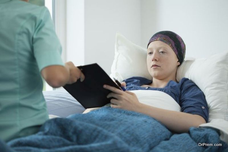 Young woman with tumor lying in bed and her diagnosis
