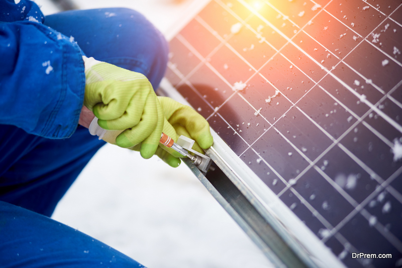 man-working-on-Solar-Panel-installation