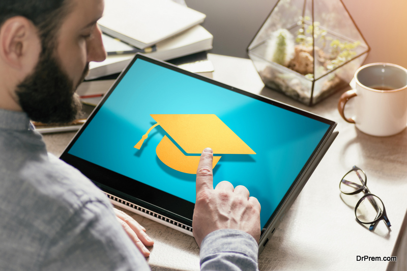 Bearded man  presses on the graduation hat icon