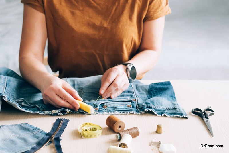 woman repairing clothes